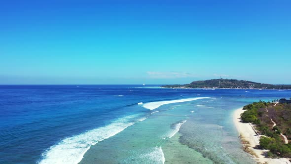 Aerial nature of beautiful coast beach journey by transparent lagoon and bright sandy background of 