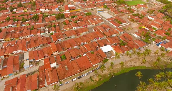 Aerial view of rooftops and small streets of Rio do Fogo town, Brazil.