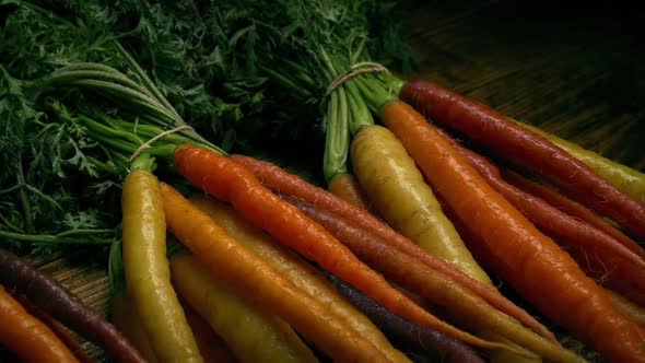 Passing Washed Carrots In Bunches