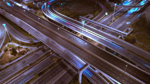 4K : Aerial Hyper lapse drone view of road junction with moving cars.