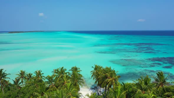 Aerial above travel of perfect coastline beach time by turquoise water with bright sandy background 