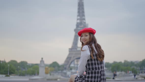 Beautiful young woman spending time in Paris.