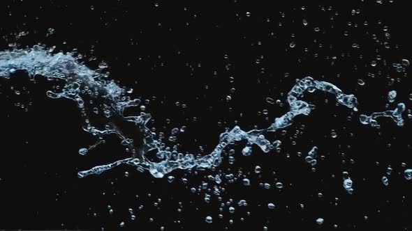 Flying Water Jet In Black Background