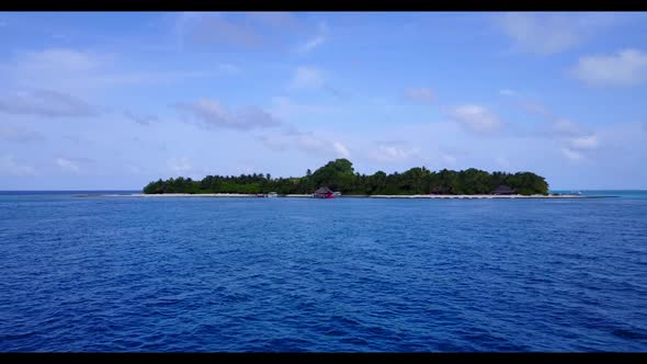 Aerial panorama of exotic bay beach wildlife by blue green sea with white sandy background of advent