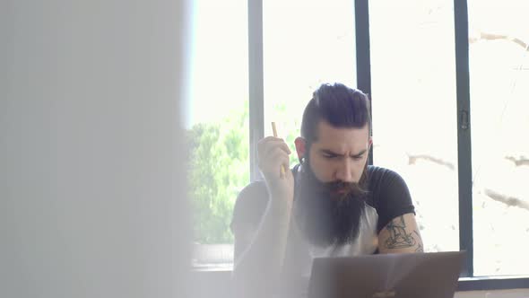 Man using laptop computer