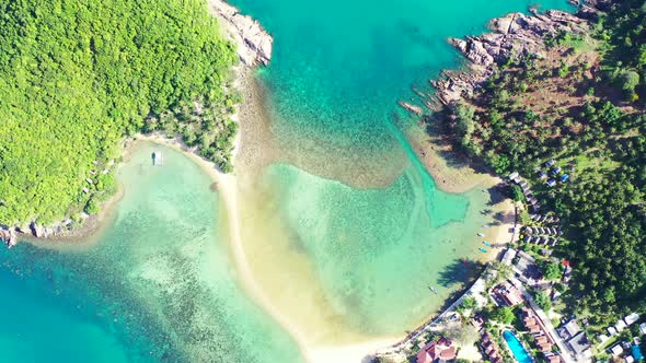 Daytime aerial travel shot of a paradise sunny white sand beach and blue ocean background in high re