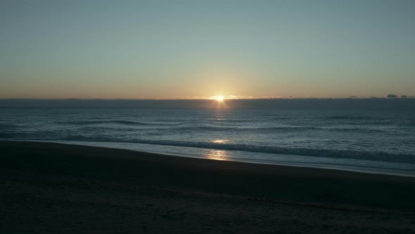 Sun on the Horizon Over the Ocean