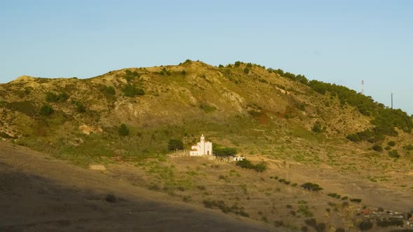 Isolated church of Our Lady of Grace in Porto Santo island at sunset, Portugal. Timelapse