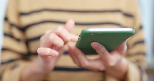 Woman working on smart phone