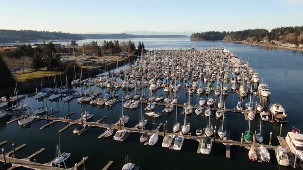 Flying over a marina at sunset in Olympia Washington on the Puget Sound