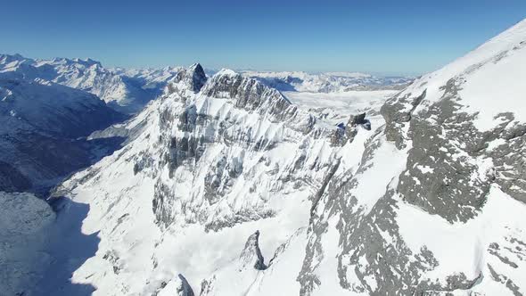 Flying Above Snow Mountain Landscape