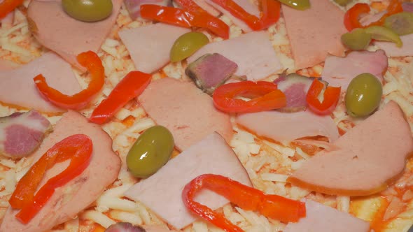 Adding olives  on pizza base  before baking  4K 2160p UHD footage - Italian food pizza base  with ol