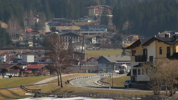 Heavy Truck Driving Along Road in Resort Town, Exhaust Fumes, Ecology Problem