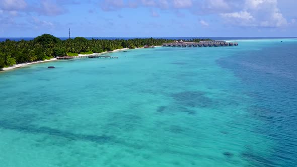 Aerial travel of bay beach by blue sea and sand background