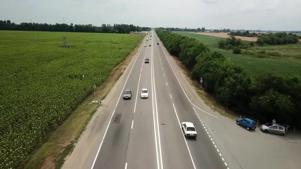 Aerial Fly Over Motorway, Freeway Traffic - Trucks and Cars on the Road