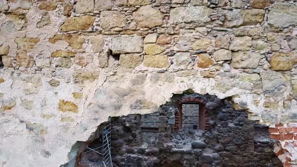 Medieval Castle Ruins in Latvia Rauna. Aerial View Over Old Stoune Brick Wall of Raunas Castle 