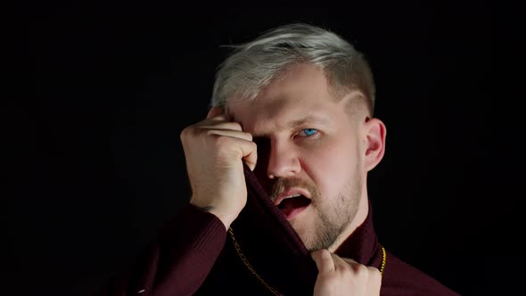 Stylish Man with Blue Eyes in Trendy Clothes Looking at Camera Feeling Happiness Fun Enjoyment