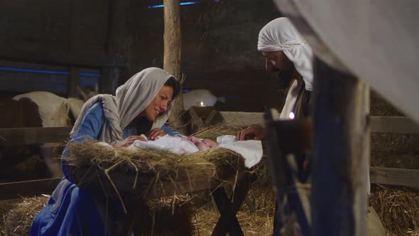 Mary And Joseph with Baby Jesus in Barn