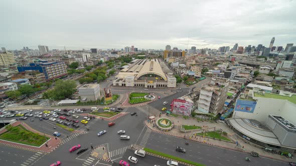 Time lapse of Aerial view of Hua Lamphong or Bangkok Railway Terminal Station with skyscraper