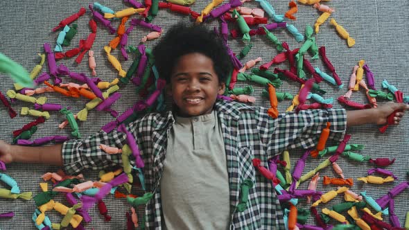 Boy Lying in Candied