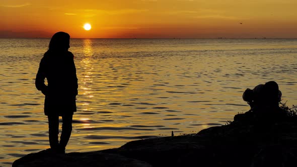 People Silhouette Near The Sea 1