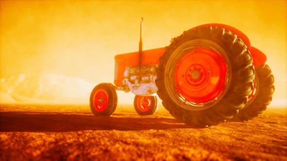 Vintage Retro Tractor on a Farm in Desert alt