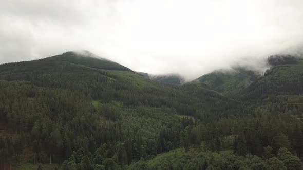 Aerial Flying Above the Clouds And Mountains