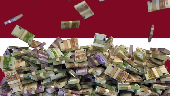 Euro Banknotes falling in front of flag of Latvia