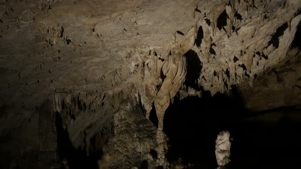 Old cave formations of stalactites and stalagmites 3840X2160 UltraHD  footage - Deep inside  undergr