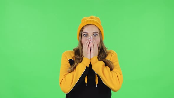 Portrait of Modern Frustrated Girl in Yellow Hat with Shocked Wow Face Expression