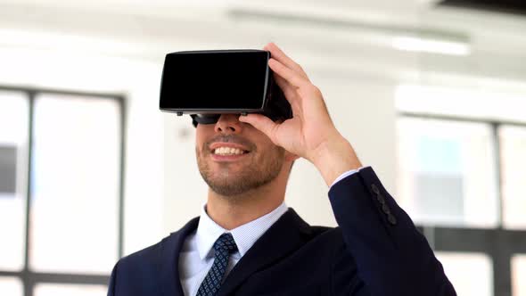 Businessman with Virtual Reality Headset at Office 107