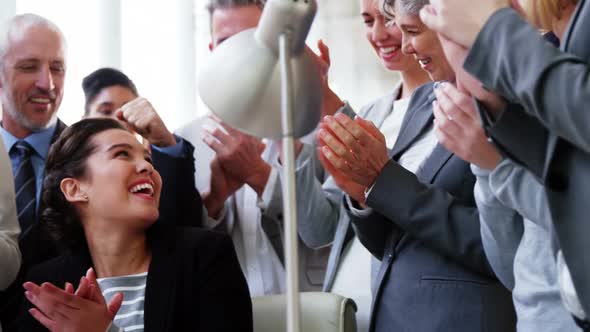 Group of business people appreciating their colleagues works