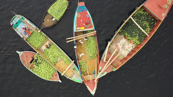 Aerial view of people working on commercial boats, Buriganga, Dhaka, Bangladesh.