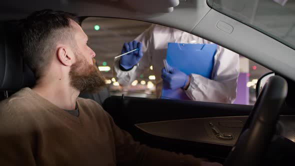 Video of stopping a car to make a coronavirus test. Shot with RED helium camera in 8K.