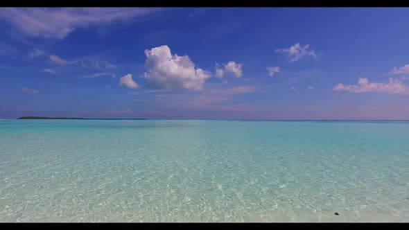 Aerial drone landscape of exotic island beach lifestyle by clear ocean and white sandy background of