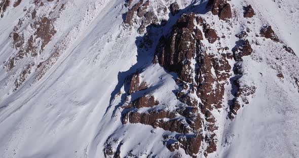 Huge Rocks Covered with Snow