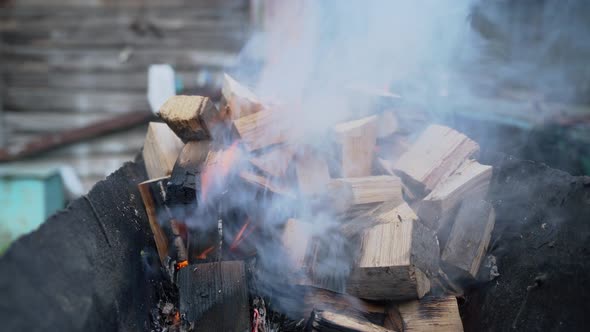 Firewood Is Burning in the Barbecue Grill