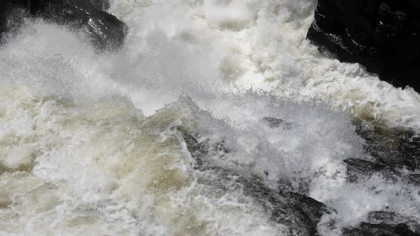 Strong Flow and Boiling of Water in Mountain River with Splashes. Fast Stream