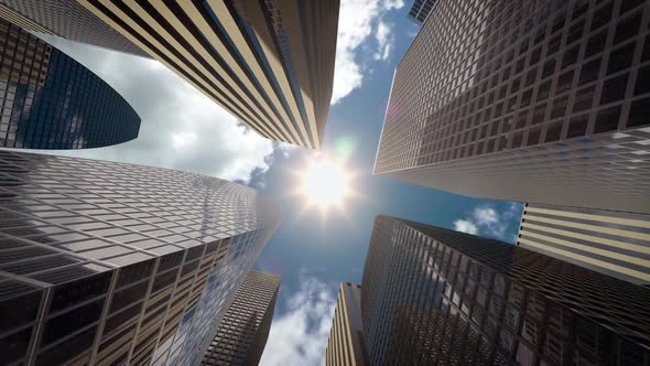 Office Buildings and Skyscrapers in Business District Against Skyline Timelapse