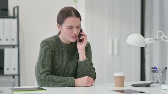 Young Woman Angry on Smartphone