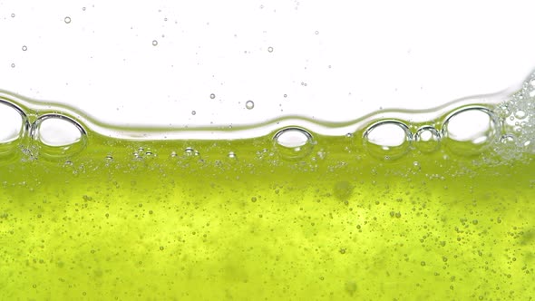 Bubbles in a yellow liquid