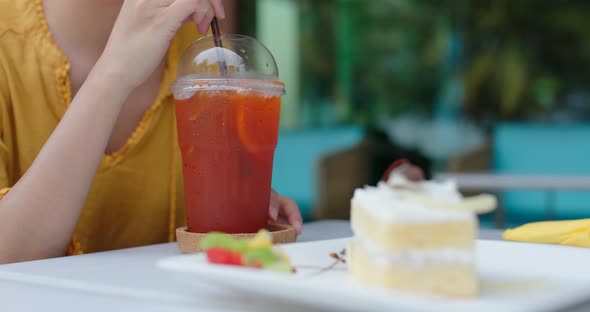 Woman have cake at coffee shop