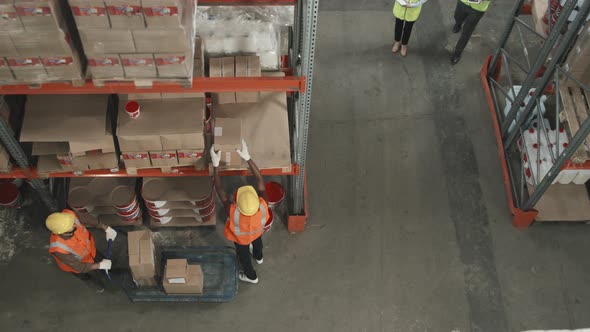 Top View of People Working in Warehouse
