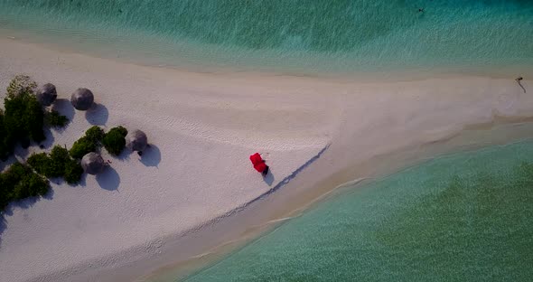 Wide above abstract shot of a sunshine white sandy paradise beach and turquoise sea background in co