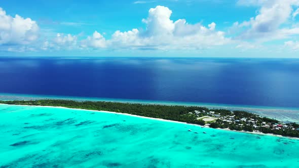 Aerial top view sky of perfect island beach vacation by blue sea and white sand background of a dayt
