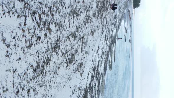 Vertical Video of Low Tide in the Ocean Near the Coast of Zanzibar Tanzania Aerial View