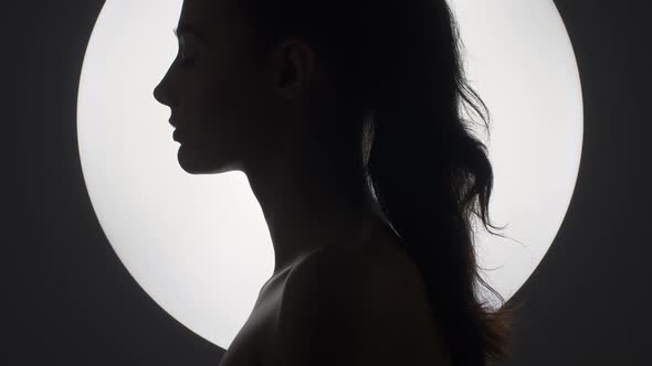 Fine Art Fashion Studio Portrait of Woman at Full Moon