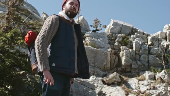 Young Man with Beard Hiking