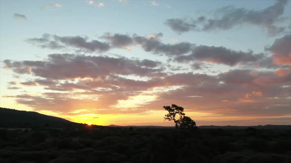 Wide rotating shot of a stunning African sunset