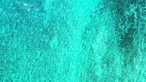 Aerial drone abstract of luxury tourist beach adventure by blue green sea with white sand background
